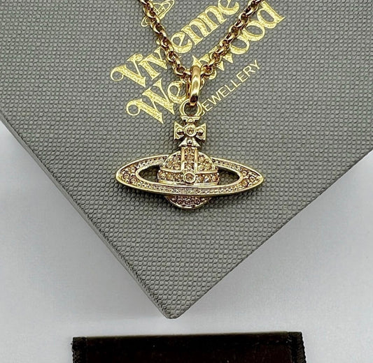 Minibas relief gold pendant