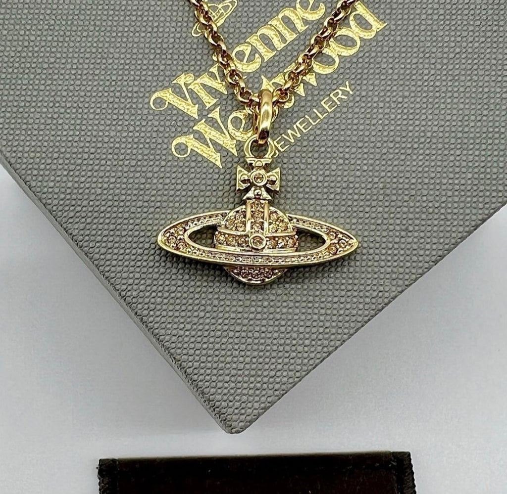 Minibas relief gold pendant
