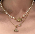 Lucrece gold pendant