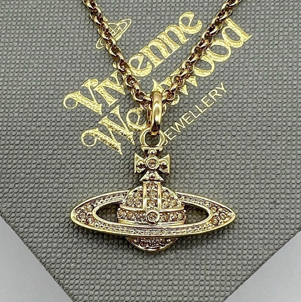 Minibas relief gold pendant