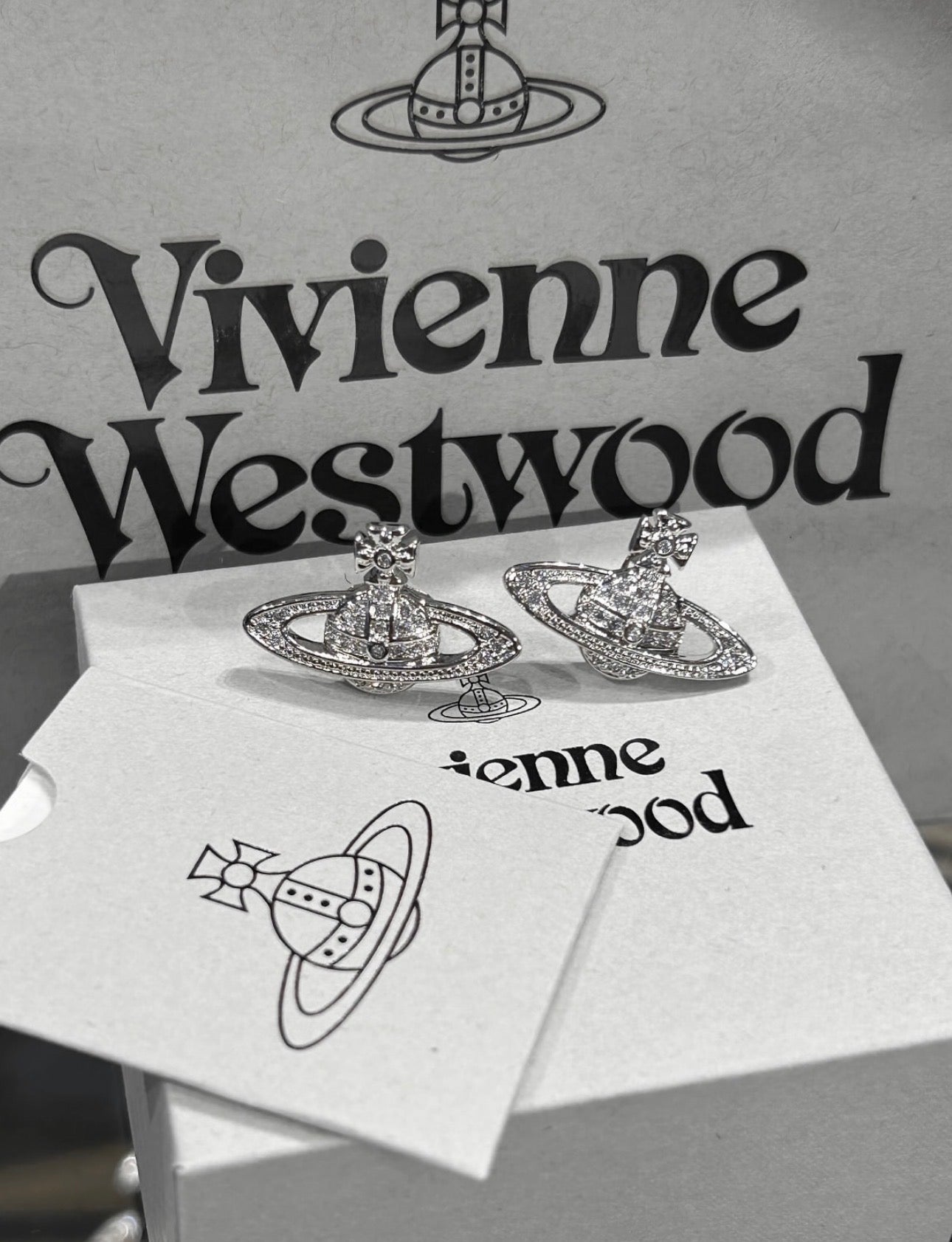 Minibas relief silver earrings