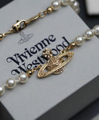 Minibas relief gold pearl choker